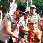 98 Siswa MIN 1 Kota Malang Dikukuhkan sebagai Pramuka Garuda Siaga Terbanyak pada Apel HUT Pramuka ke-64
